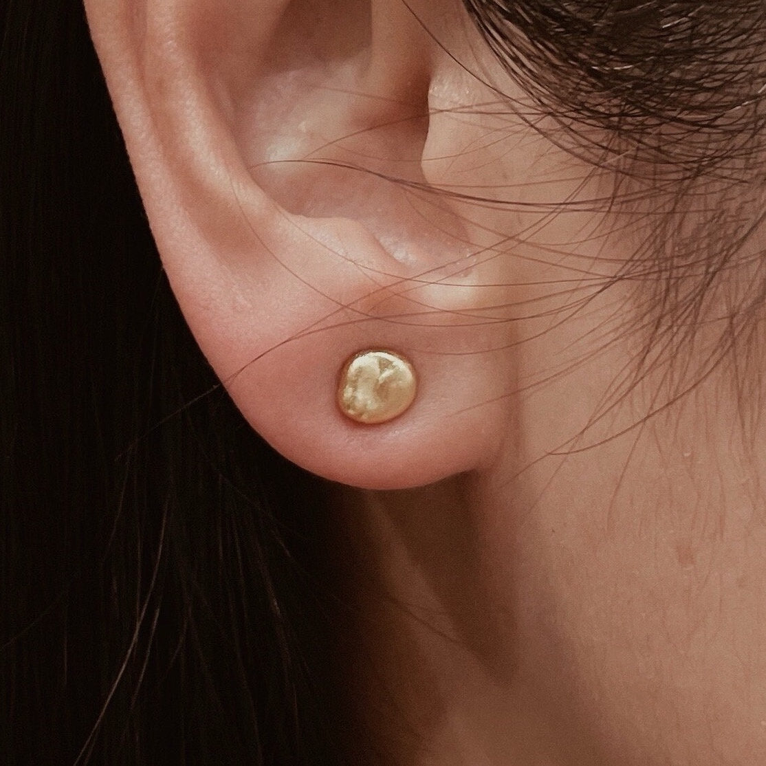 Gold bead earring studs in minimalist design