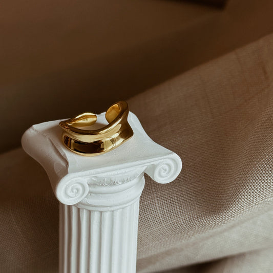 Gold plated wave ring with a bold, adjustable design