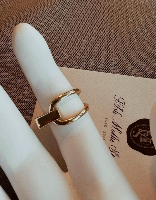 Rectangular gold ring with bold statement design