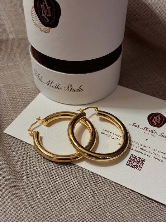 Gold plated big hoop earrings with classic design