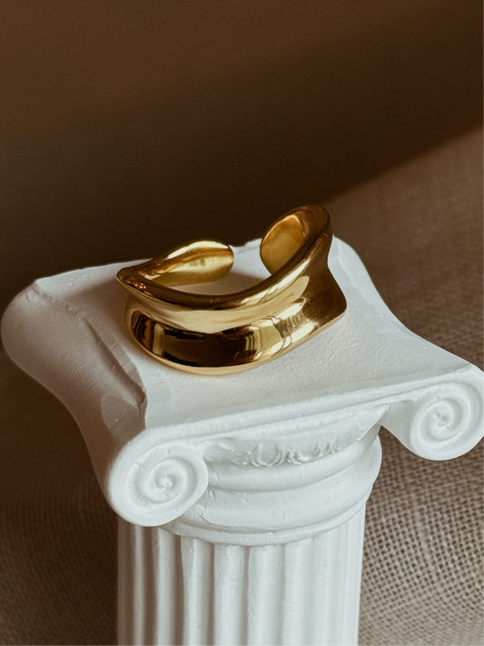 Gold plated wave ring with a bold, adjustable design