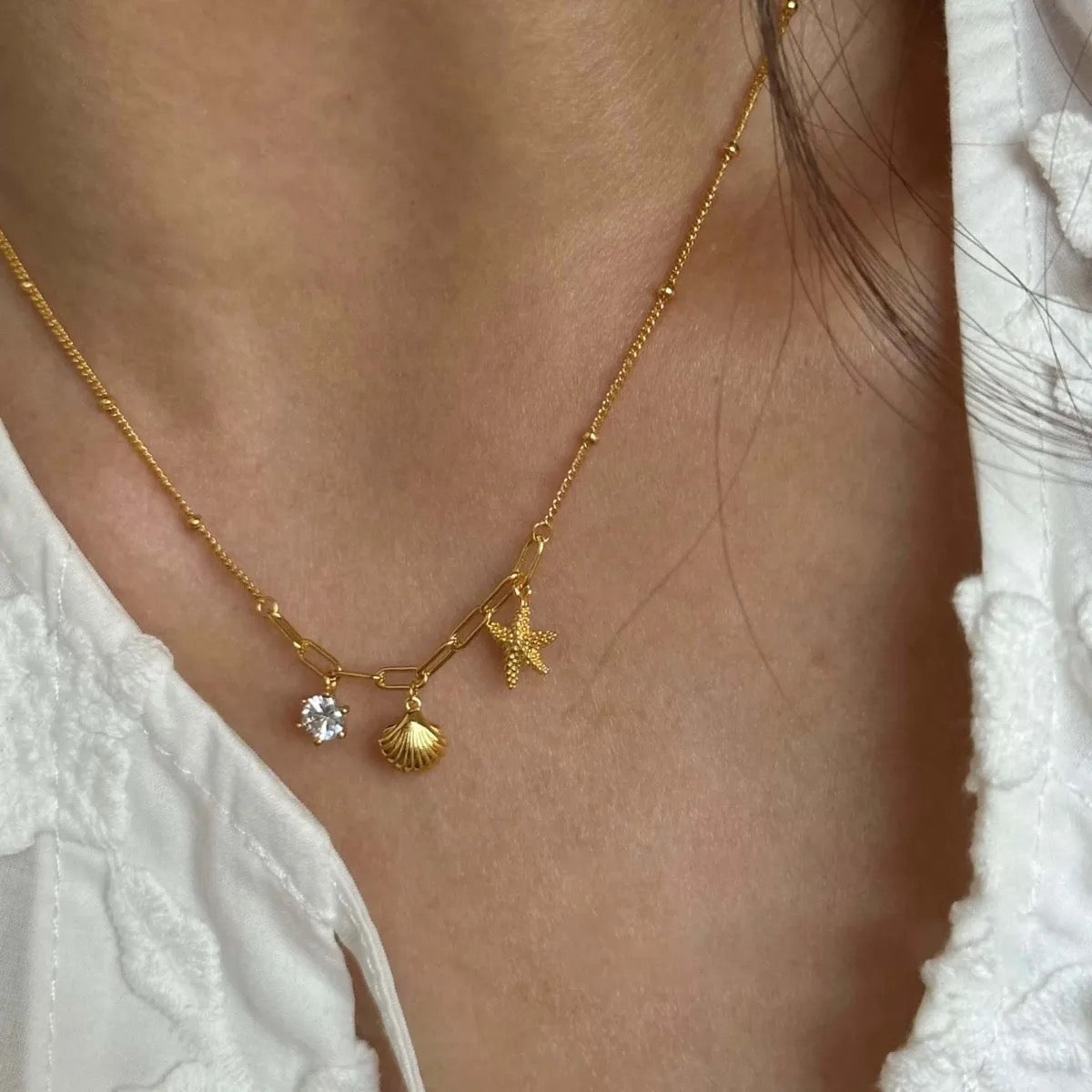 THEIA  Seashell, Star, and Crystal Necklace